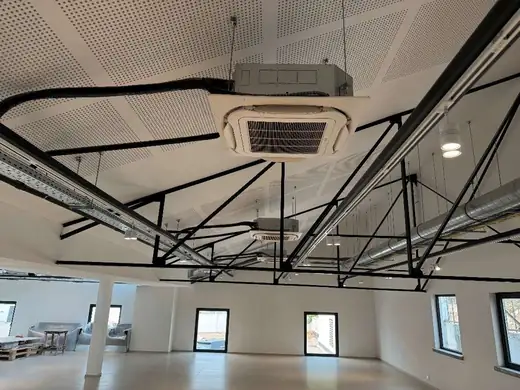 Cassette de climatisation sous charpente métallique